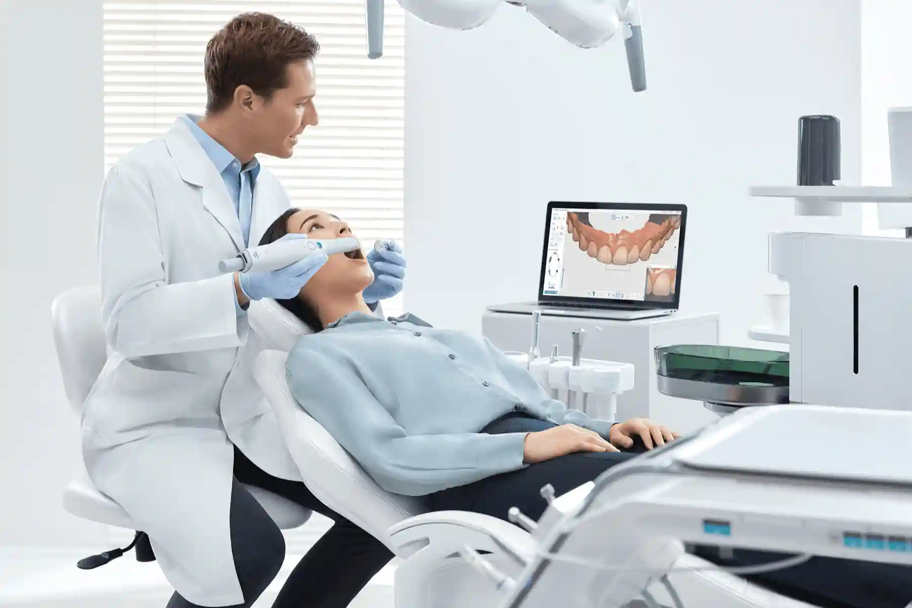 Dentist capturing digital impression using intraoral scanner - Miracle Dental Lab